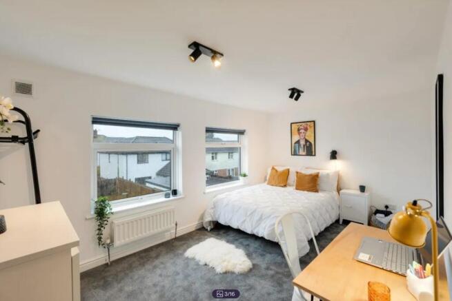 A spacious and inviting large double bedroom wi...