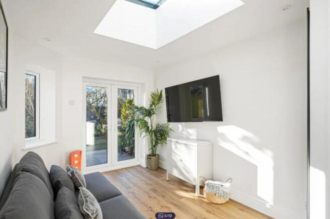 A bright and spacious modern living room with l...