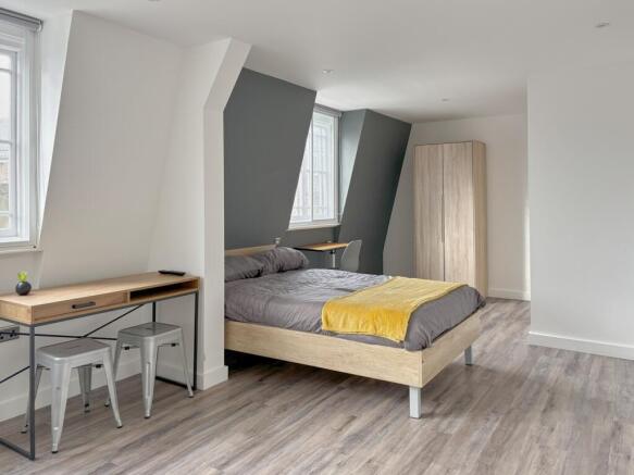 A spacious and bright large double bedroom feat...