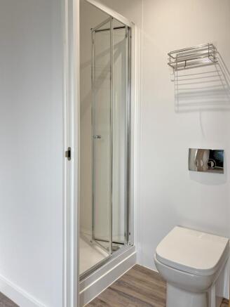 A modern and well-maintained bathroom featuring...