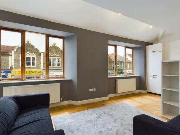 A spacious and bright modern living room with l...
