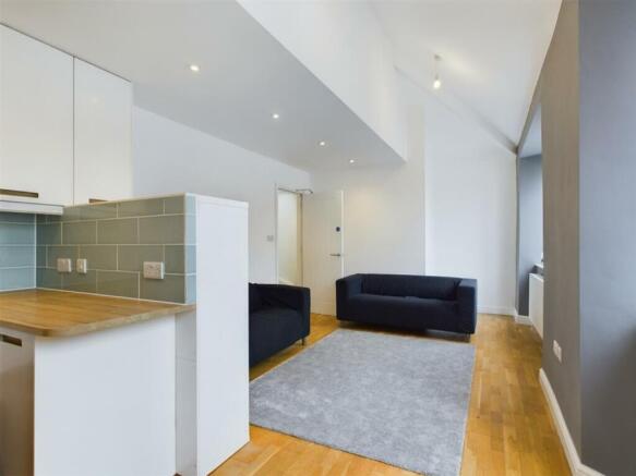 A spacious and stylish modern living room with ...
