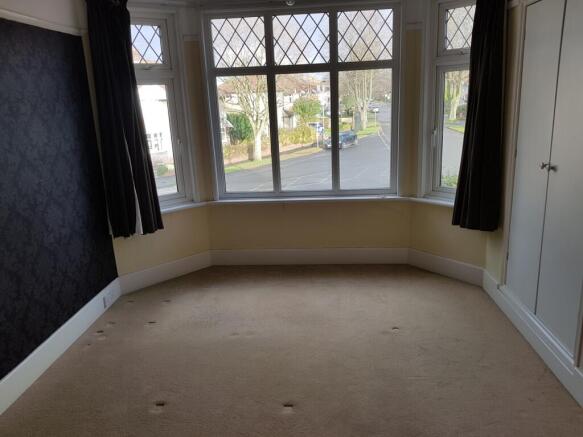 A spacious and bright large double bedroom with...