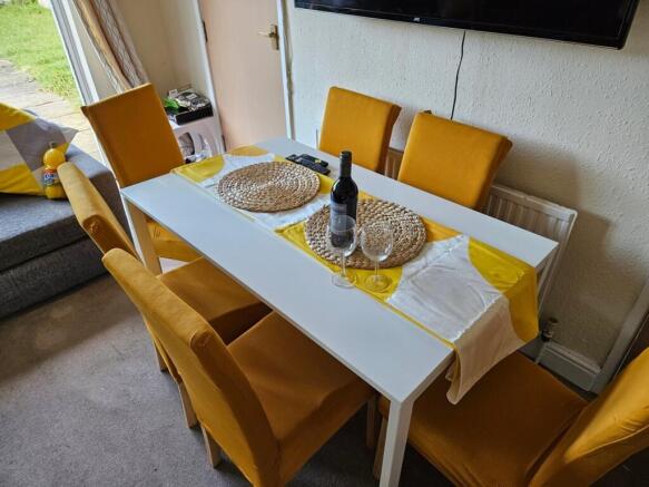 A bright and inviting large modern living room,...