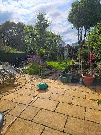 A beautifully maintained garden with vibrant fl...