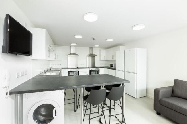 A modern and spacious kitchen, perfect for stud...