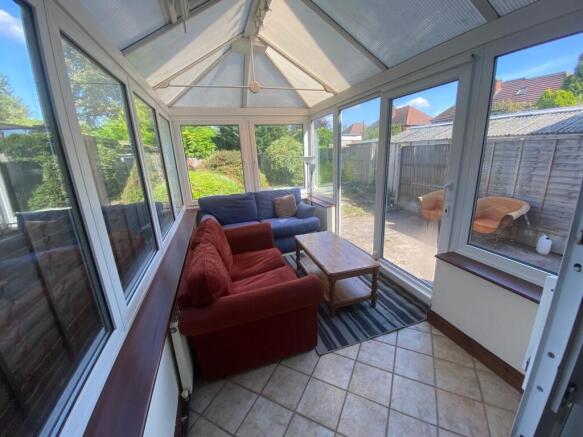 A bright and inviting large modern living room ...