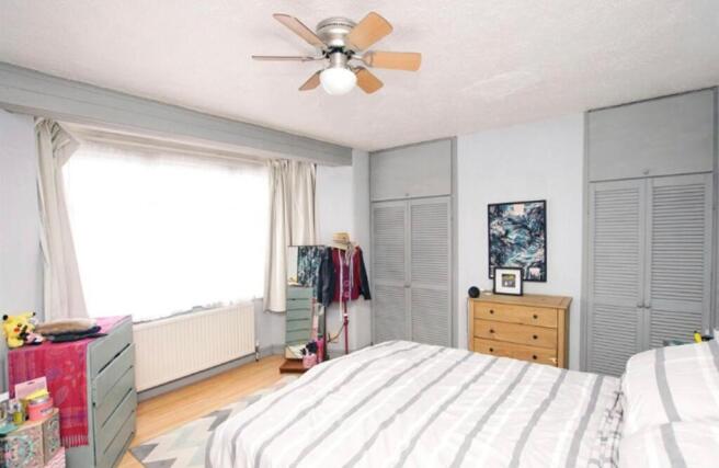 A spacious and bright large double bedroom with...