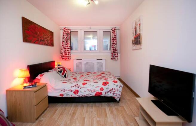 A spacious and inviting large double bedroom fe...