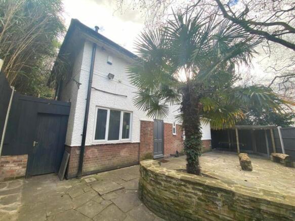 A welcoming exterior view of a property featuri...