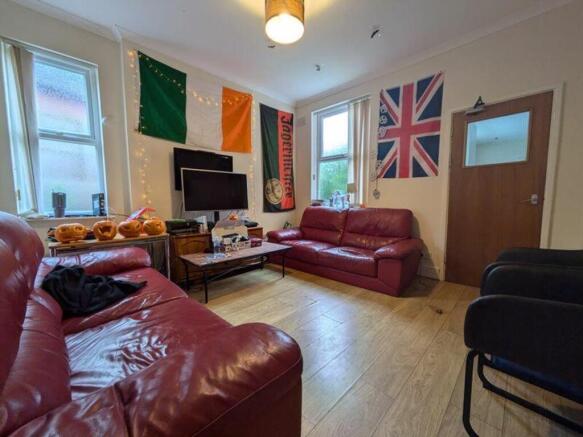 A spacious and inviting large modern living roo...
