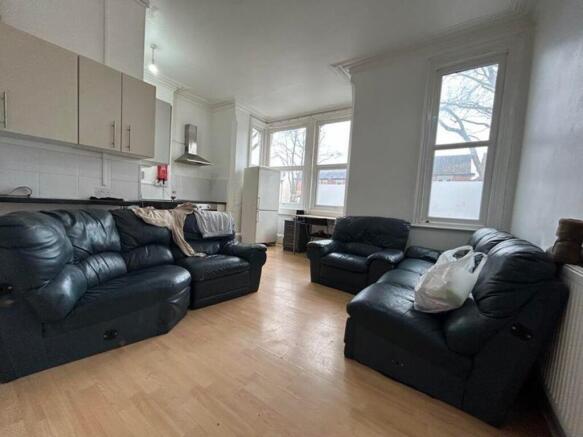 A spacious and inviting large modern living roo...