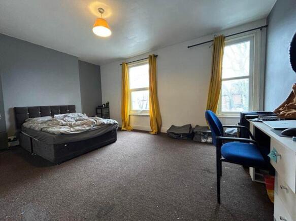 A spacious and inviting large double bedroom wi...