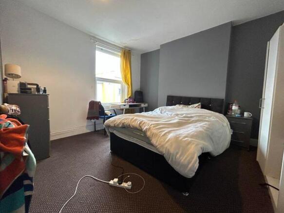 A spacious and bright double bedroom, perfect f...