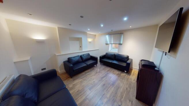 A spacious and inviting large modern living roo...