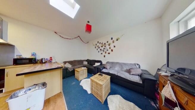 A spacious and inviting large modern living roo...