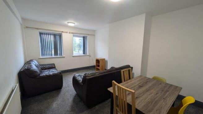 A bright and spacious living room, perfect for ...