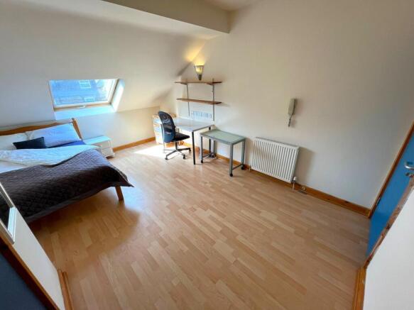 A spacious and bright large double bedroom with...