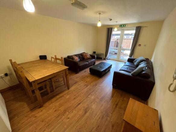 A spacious and inviting large modern living roo...