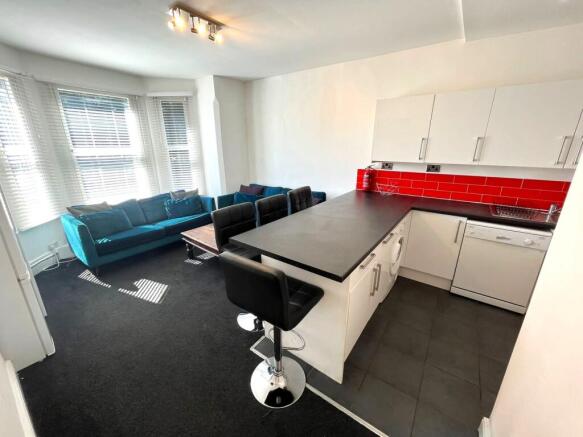 A spacious and inviting large modern living roo...