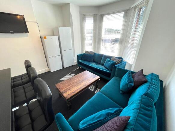 A bright and spacious modern living room perfec...