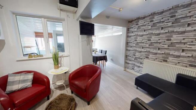 A spacious and inviting large modern living roo...