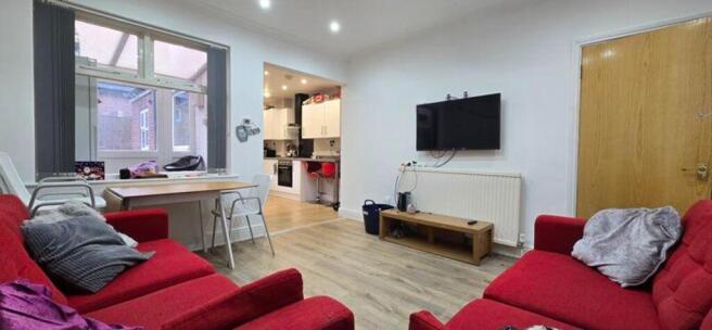 A spacious and bright large modern living room,...