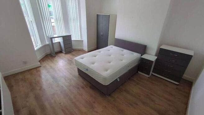 A spacious and bright large double bedroom, per...