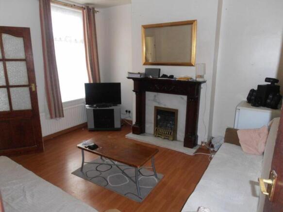 A cozy and inviting living room with a warm atm...