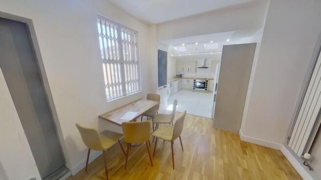 A spacious and bright kitchenette area, perfect...