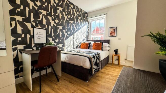 This beautifully designed double bedroom featur...