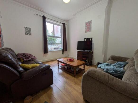 A spacious and inviting large modern living roo...