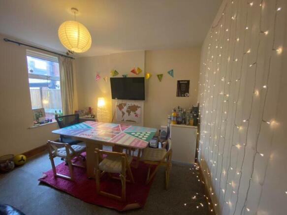A spacious and inviting large modern living roo...