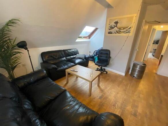 A spacious and inviting living room, perfect fo...