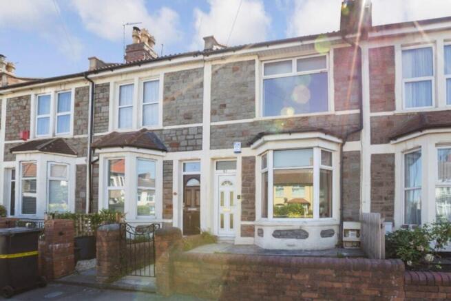 Charming front exterior of a stylish terraced h...