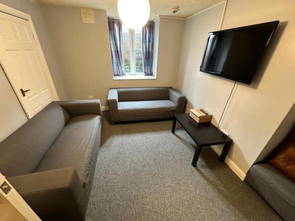 A cozy living room featuring two comfortable so...
