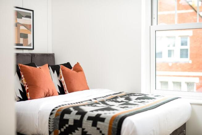 This beautifully designed double bedroom featur...