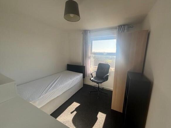 Bright and inviting double bedroom featuring a ...