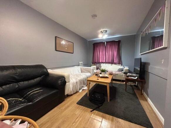 A spacious and inviting large modern living roo...