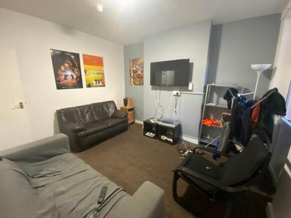 A spacious and inviting large modern living roo...