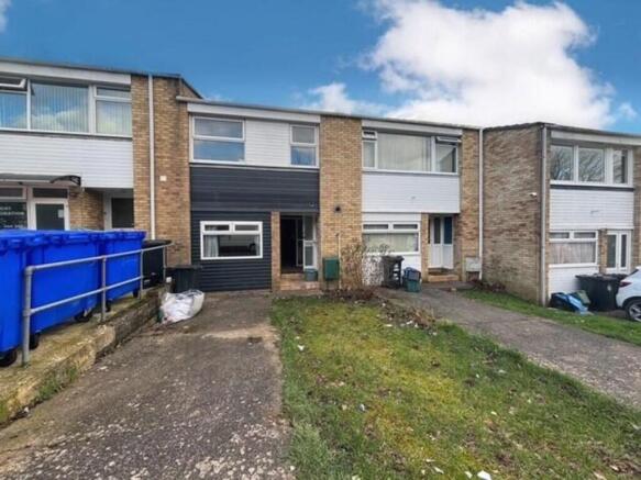 A charming front view of a modern terraced hous...