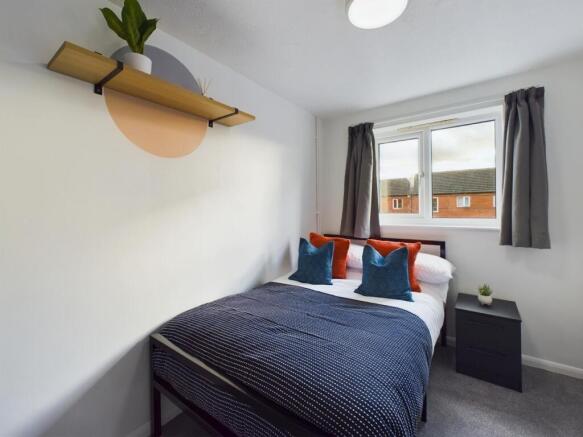 A bright and inviting double bedroom, perfect f...
