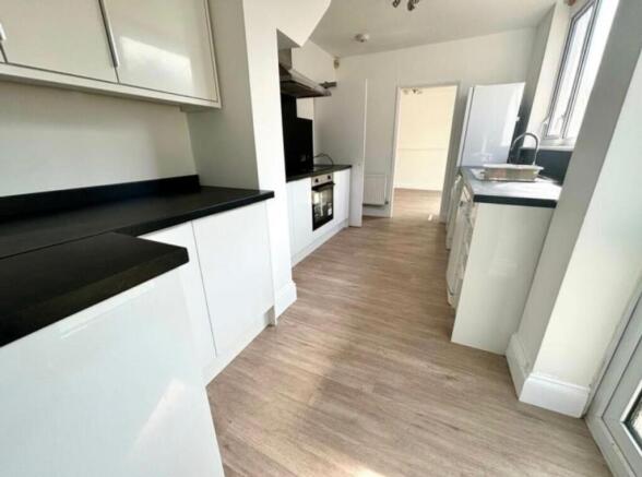 A bright and modern kitchenette featuring sleek...