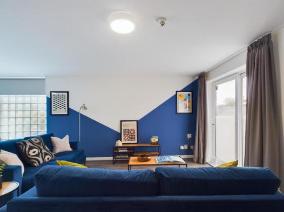 A stylish and spacious modern living room, perf...