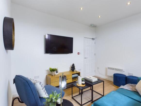 A bright and inviting large modern living room,...