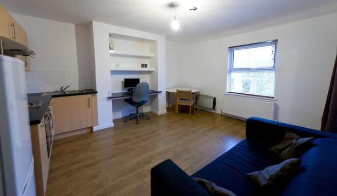This inviting living room features a cozy seati...