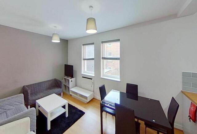 Bright and inviting living room featuring moder...
