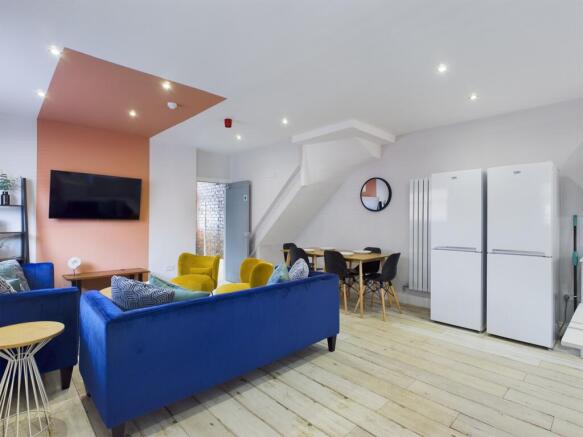 A spacious and stylish modern living room, perf...