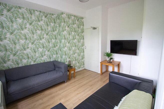 A stylish living room featuring contemporary de...