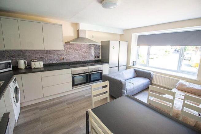 This stylish kitchen features modern appliances...